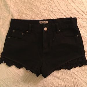 Black jean shorts with crochet/ lace trim